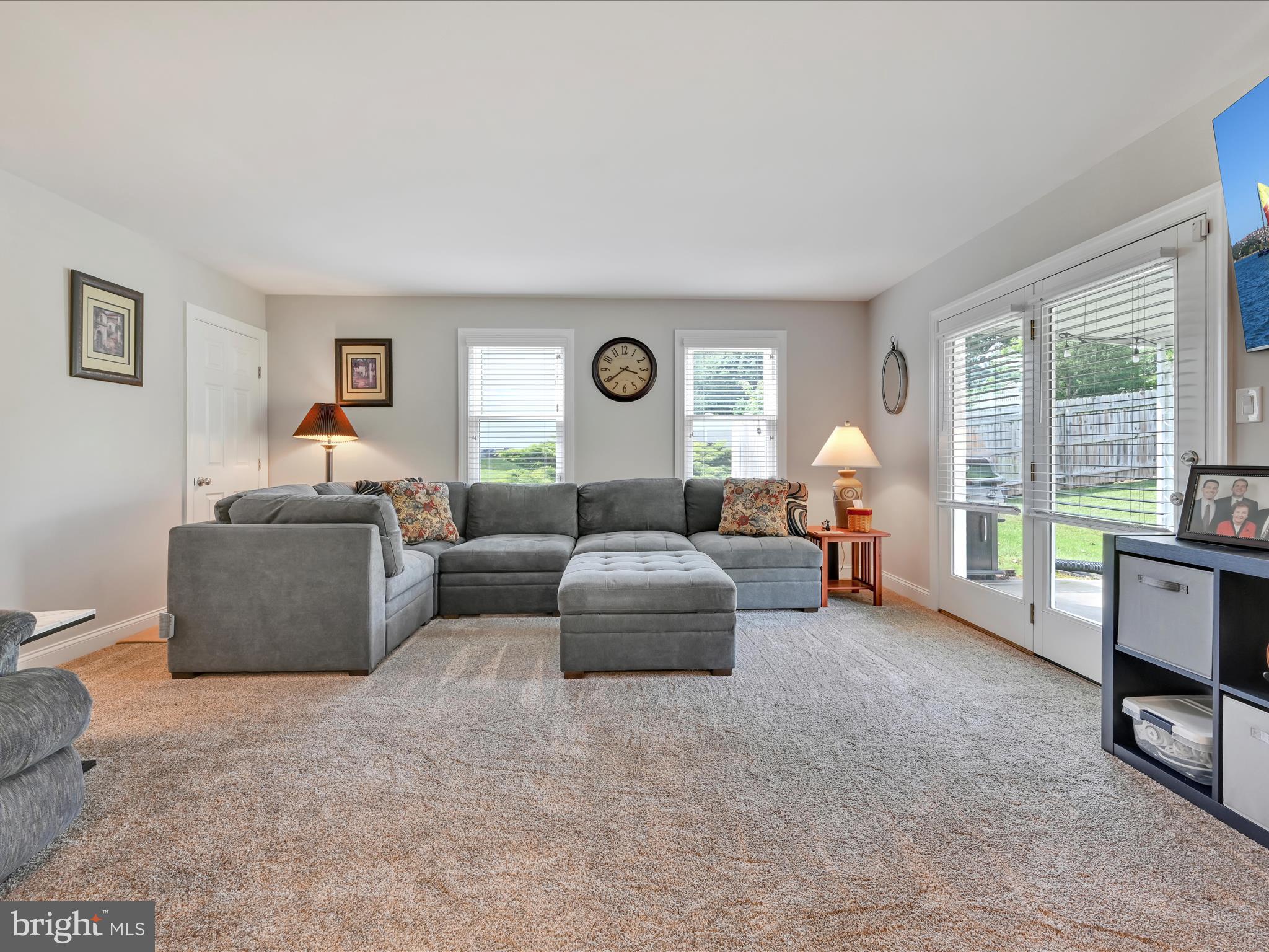461 Crosswinds Drive Lititz, PA 17543 - Photo 16 of 32 a living room with furniture and a large window