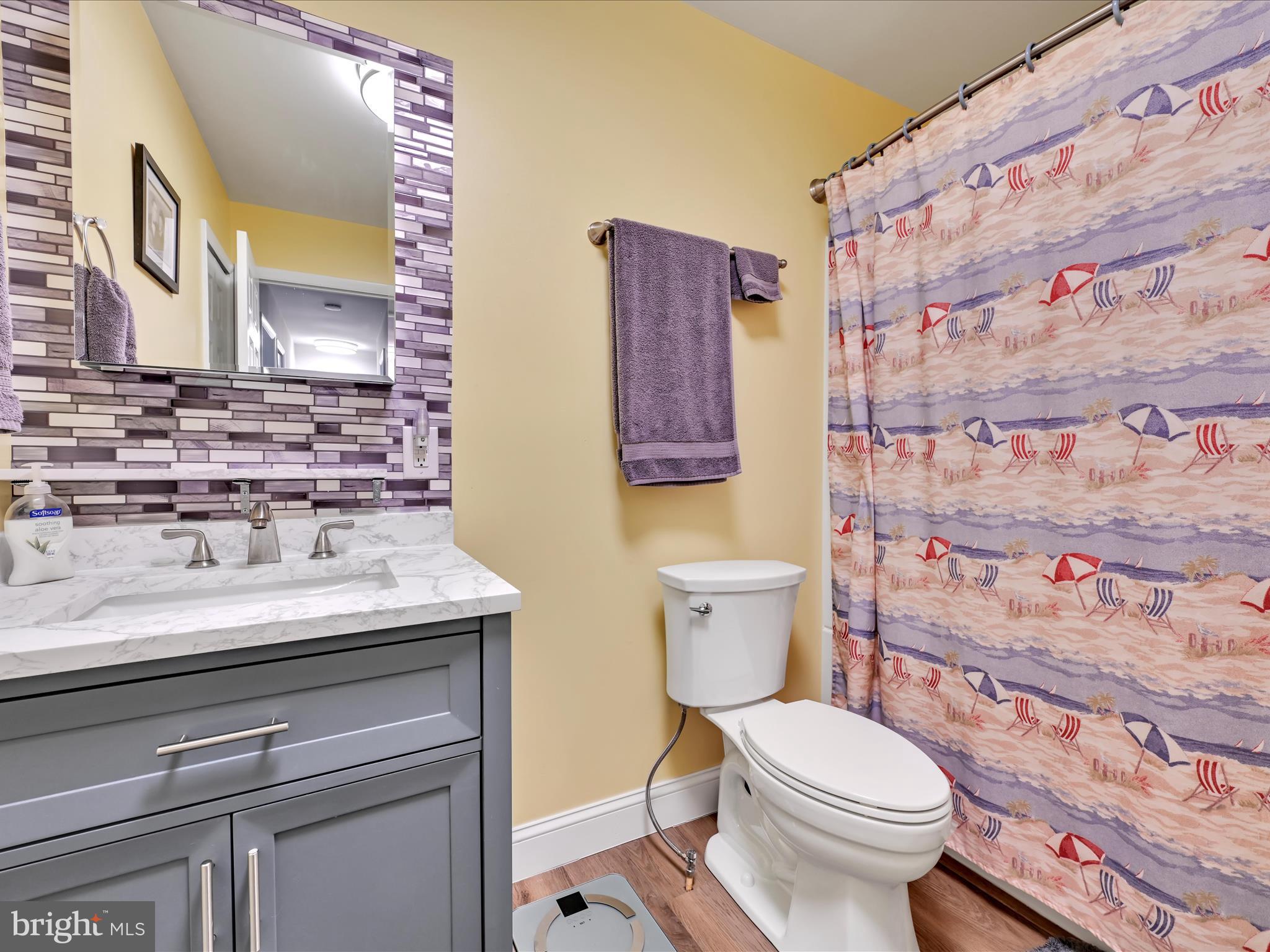 461 Crosswinds Drive Lititz, PA 17543 - Photo 23 of 32 a bathroom with a granite countertop toilet sink and mirror