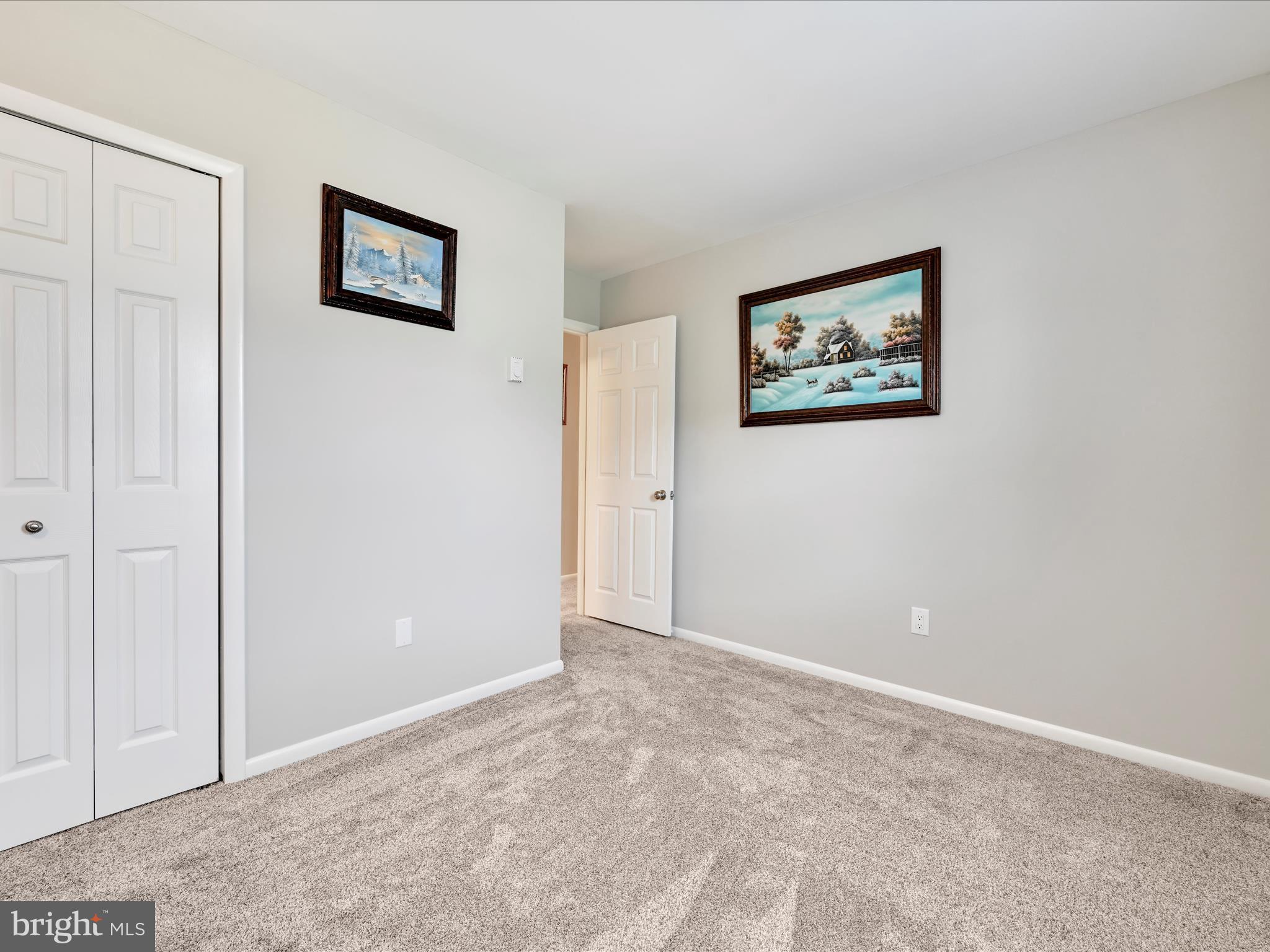 461 Crosswinds Drive Lititz, PA 17543 - Photo 25 of 32 an empty room with a painting on the wall