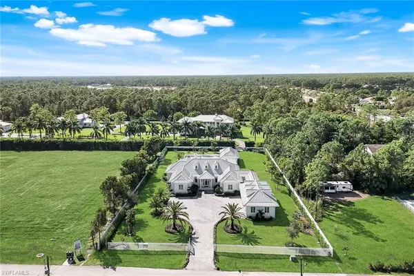 an aerial view of a house with a garden