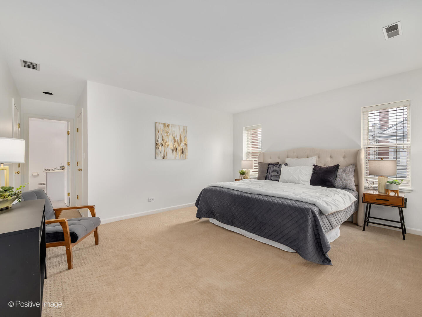 11 Manchester Lane Elmhurst, IL 60126 - Photo 18 of 29 a bedroom with bed and a window