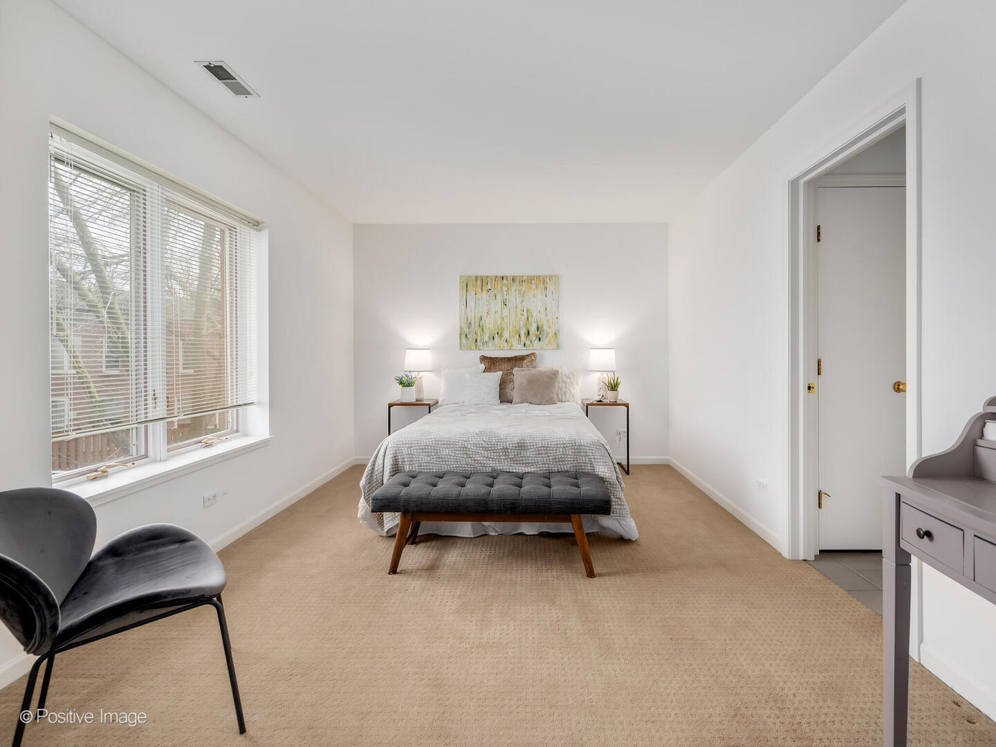 11 Manchester Lane Elmhurst, IL 60126 - Photo 19 of 29 a bedroom with a bed chair and a window