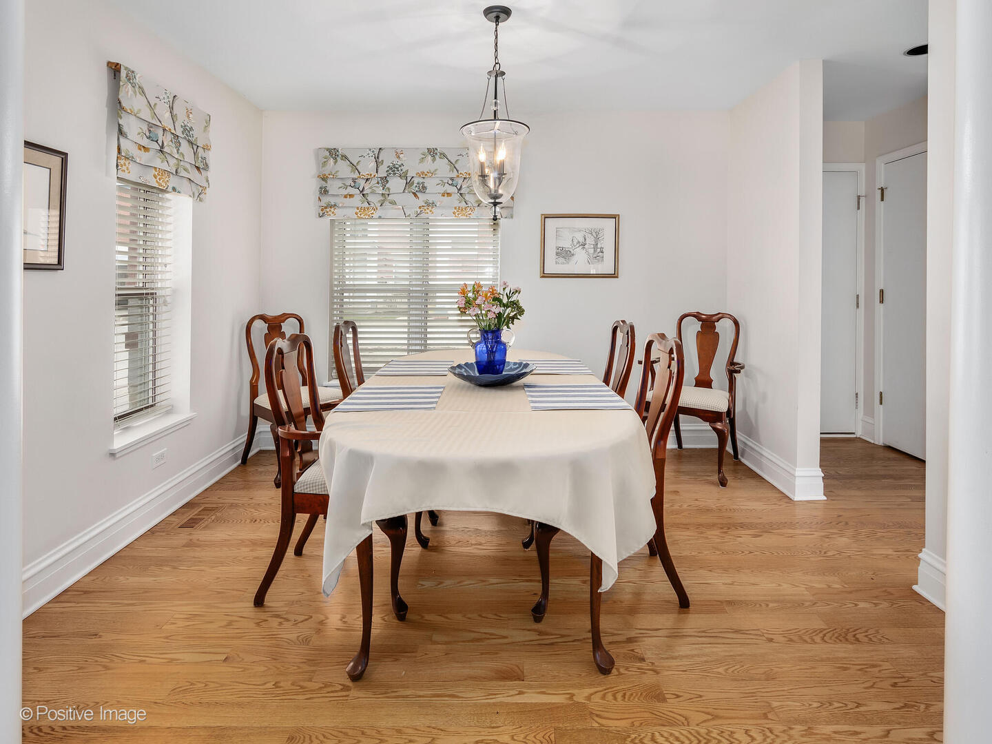 11 Manchester Lane Elmhurst, IL 60126 - Photo 6 of 29 a view of a dining room with furniture window and wooden floor