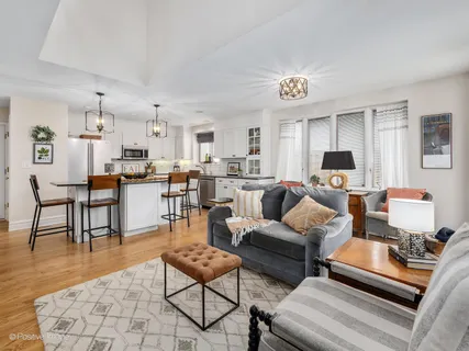 a view of a dining room kitchen and a window