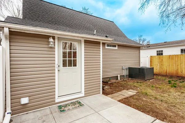 a backyard of a house with seating space