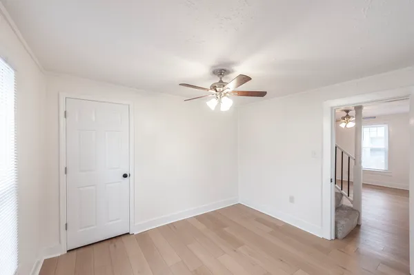 a view of a livingroom with wooden floor