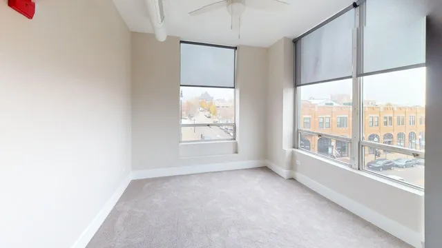 a view of an empty room with a window