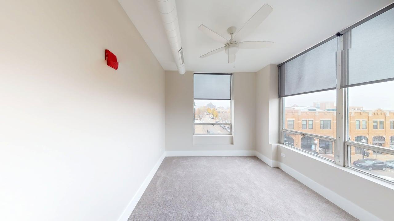 40 Dupage Court, Unit 309 Elgin, IL 60120 - Photo 14 of 18 a view of an empty room with a window