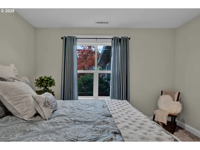 a view of a livingroom with furniture and front door