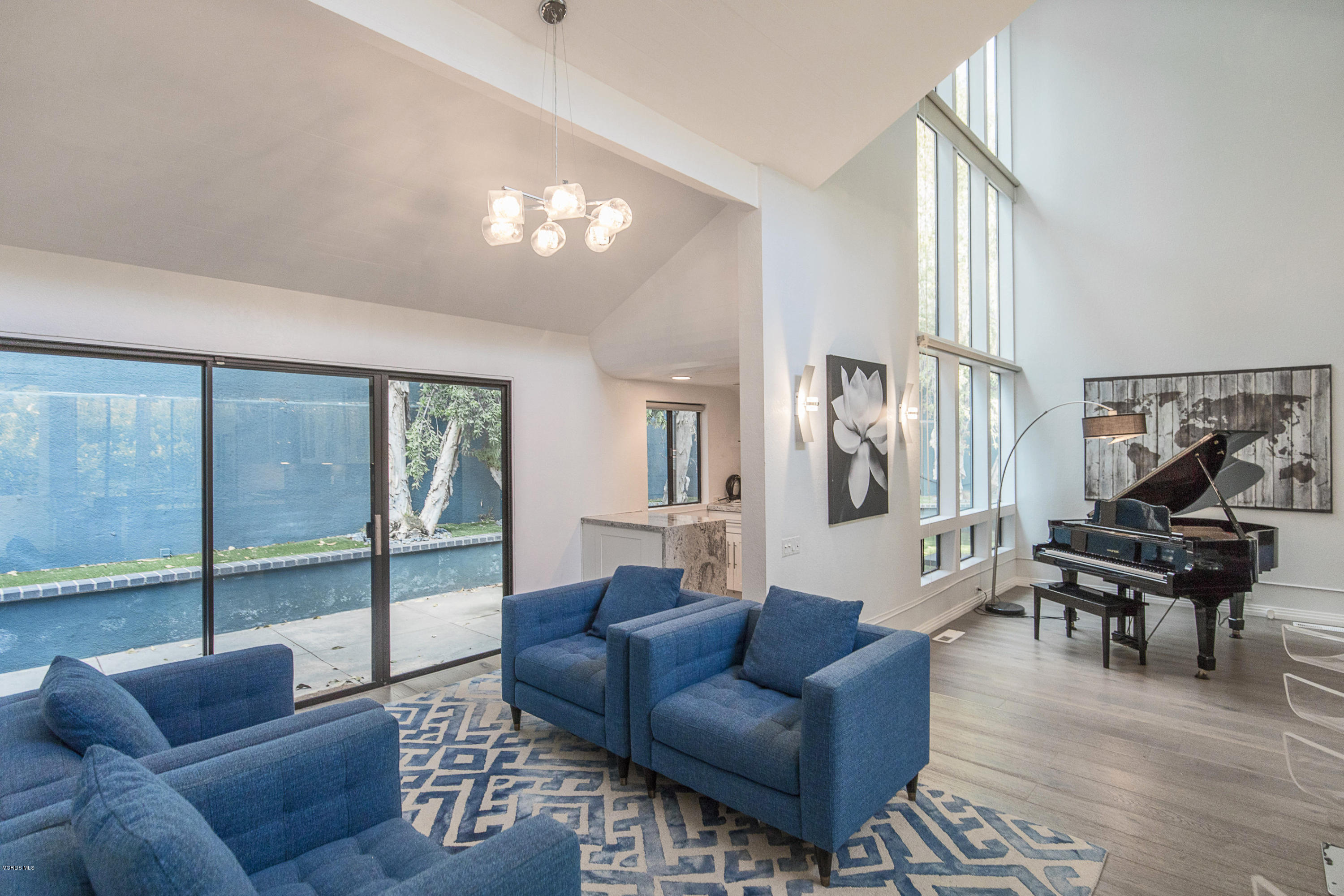 2001 Roscomare Road Los Angeles, CA 90077 - Photo 19 of 52 a living room with furniture and a large window