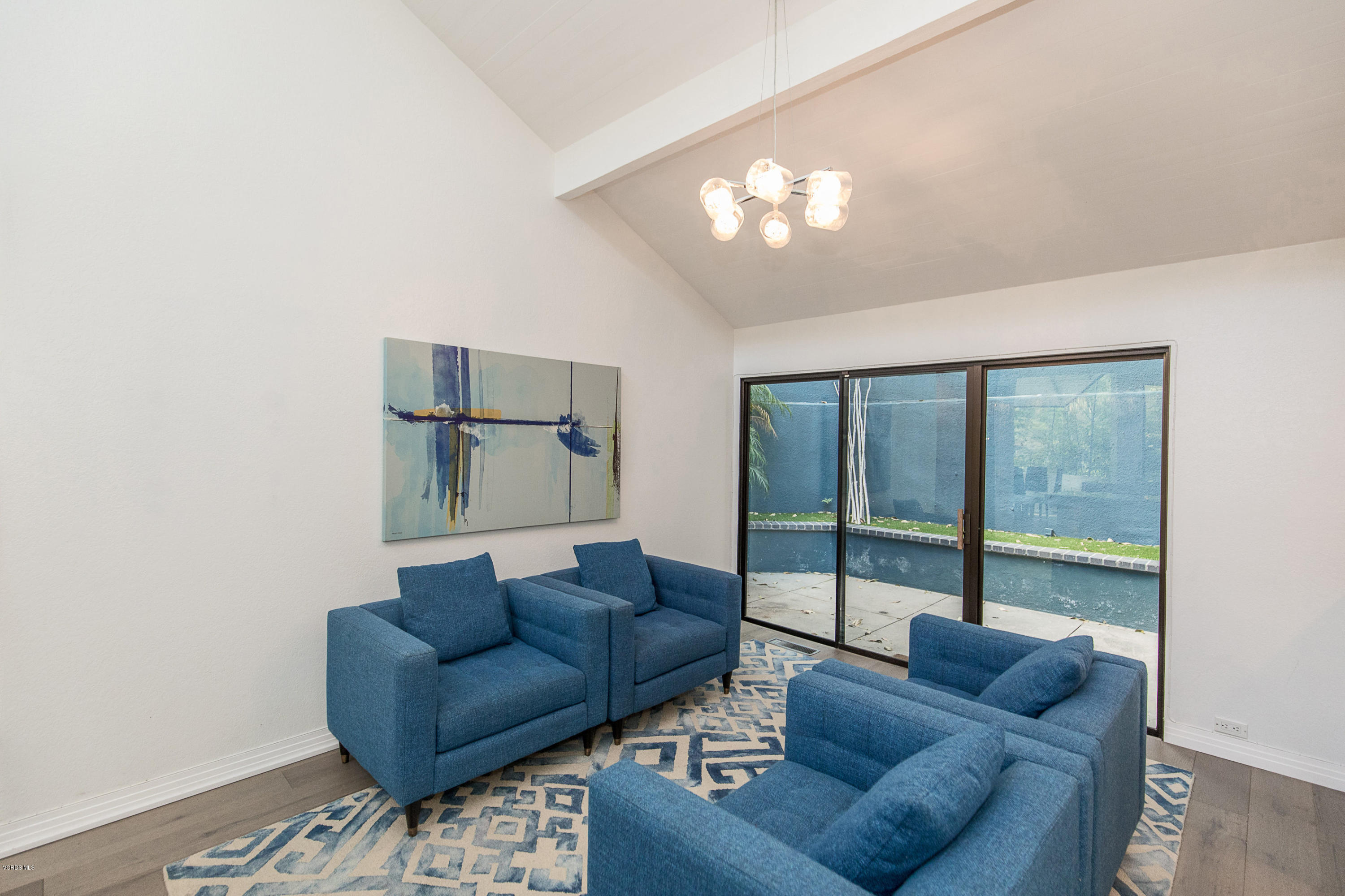 2001 Roscomare Road Los Angeles, CA 90077 - Photo 20 of 52 a living room with furniture and a large window