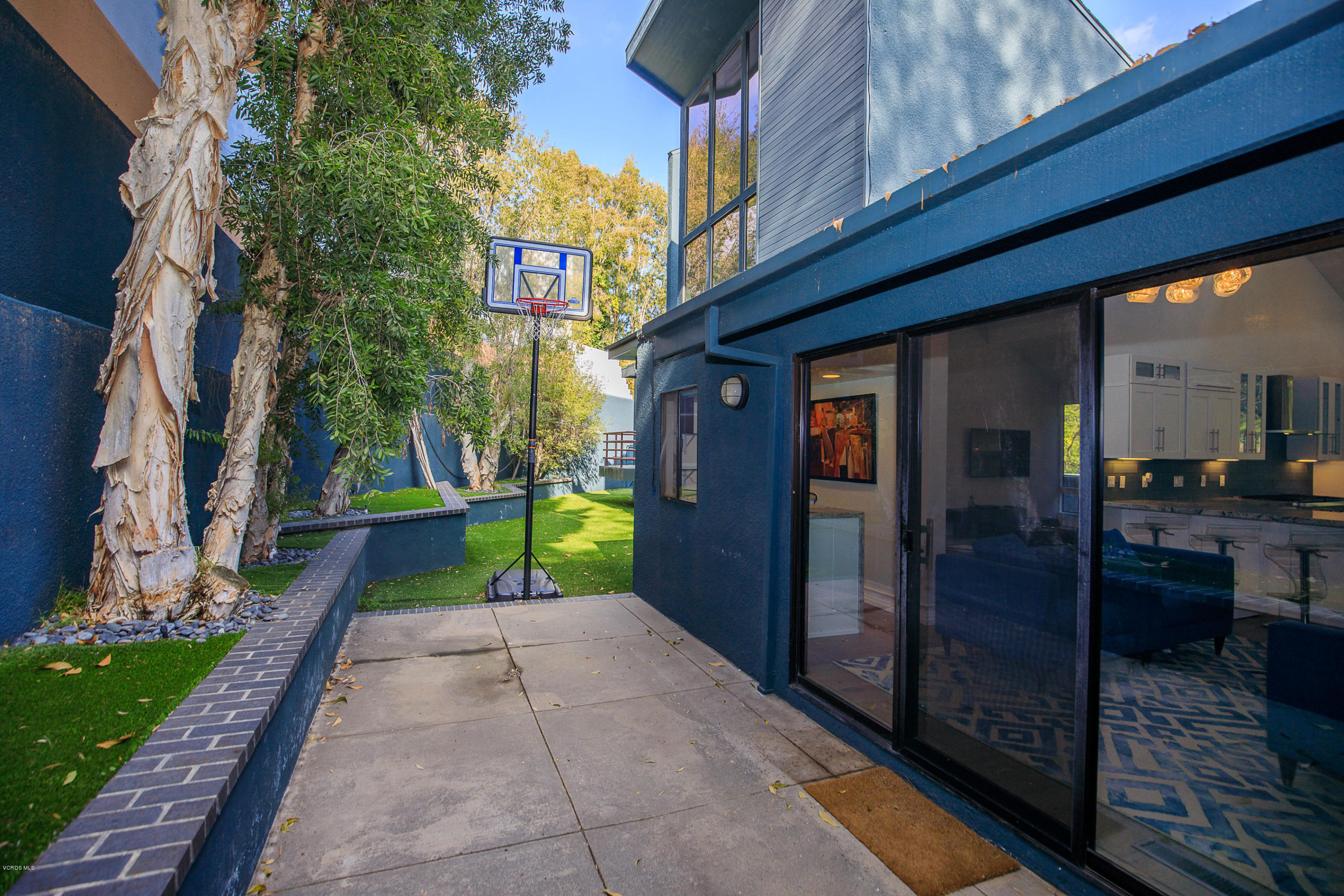 2001 Roscomare Road Los Angeles, CA 90077 - Photo 48 of 52 a view of swimming pool with a backyard