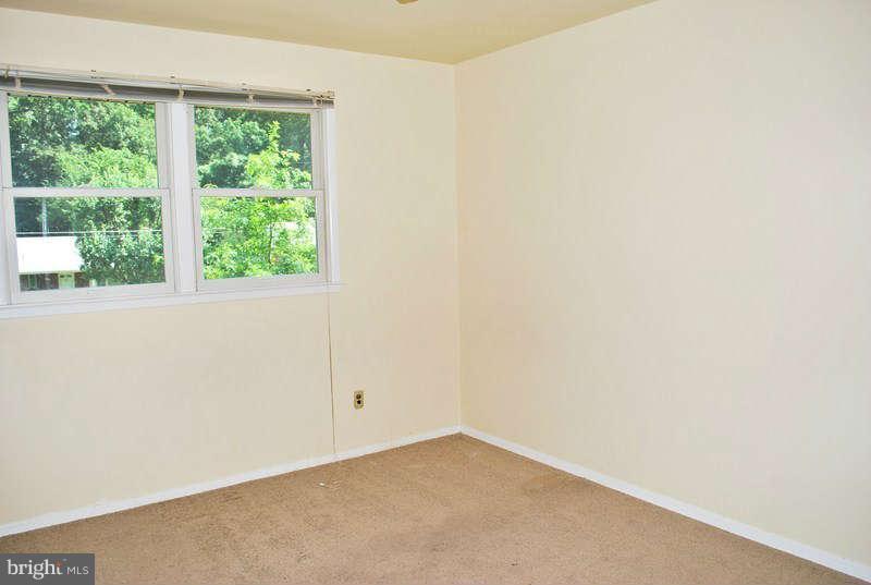 7613 Elgar Street Springfield, VA 22151 - Photo 22 of 29 an empty room with a window