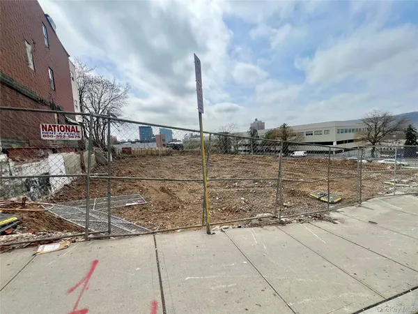 a view of a house with a street
