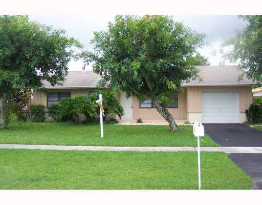 9404 Affirmed Lane Boca Raton, FL 33496 - Photo 1 of 11 Exterior Front