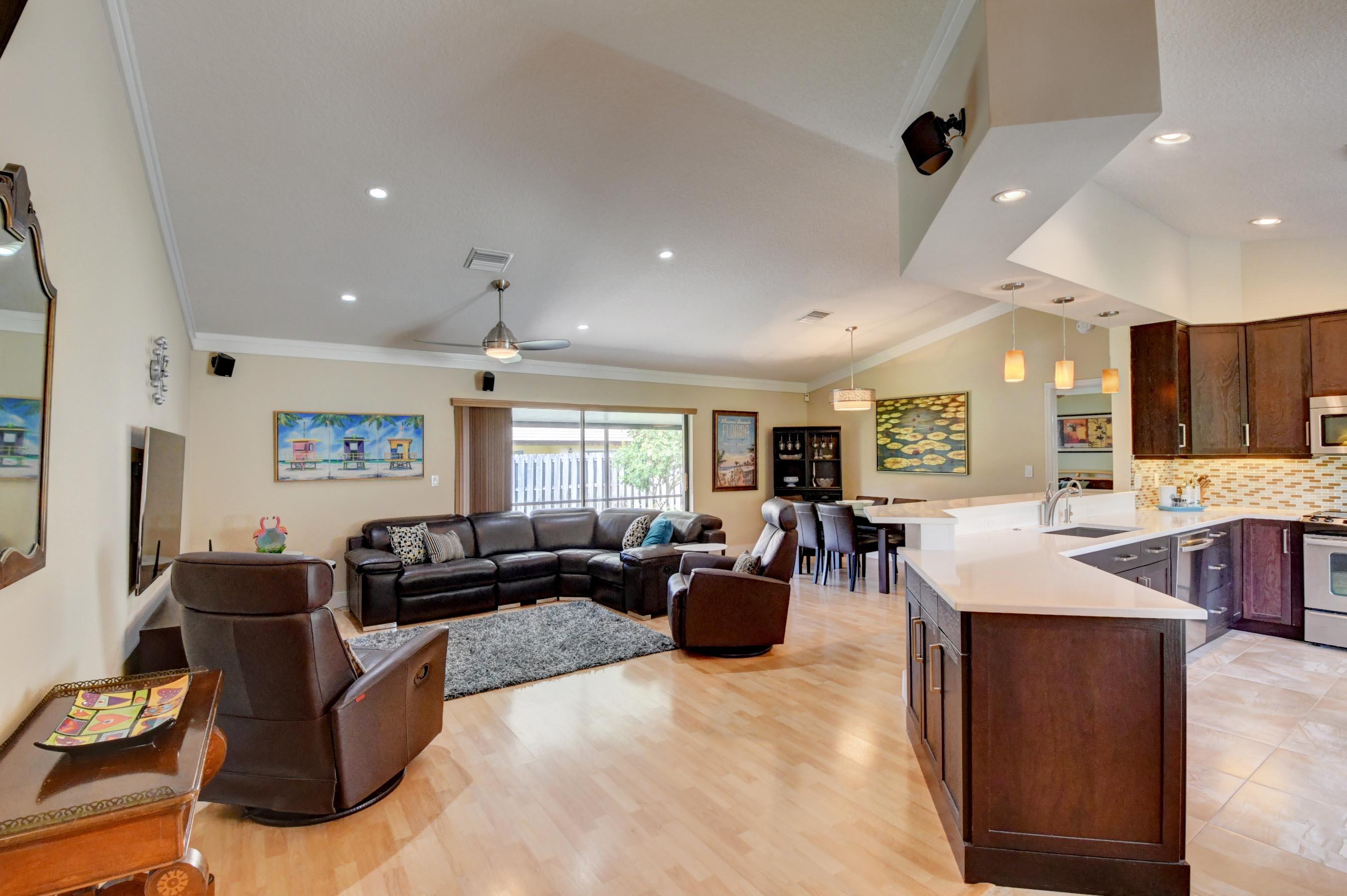 7903 West Country Club Boulevard Boca Raton, FL 33487 - Photo 7 of 32 Living Room and Kitchen