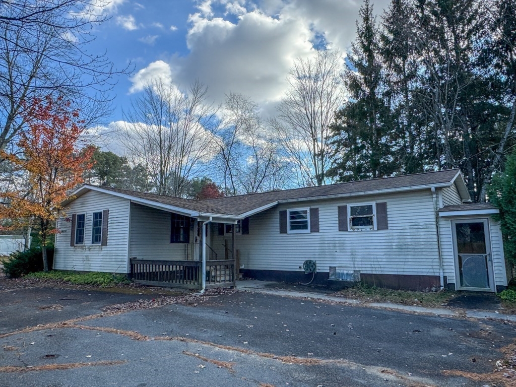 202 Turnpike Road Montague, MA 01351 - Photo 1 of 42 a view of a house with a yard and large tree