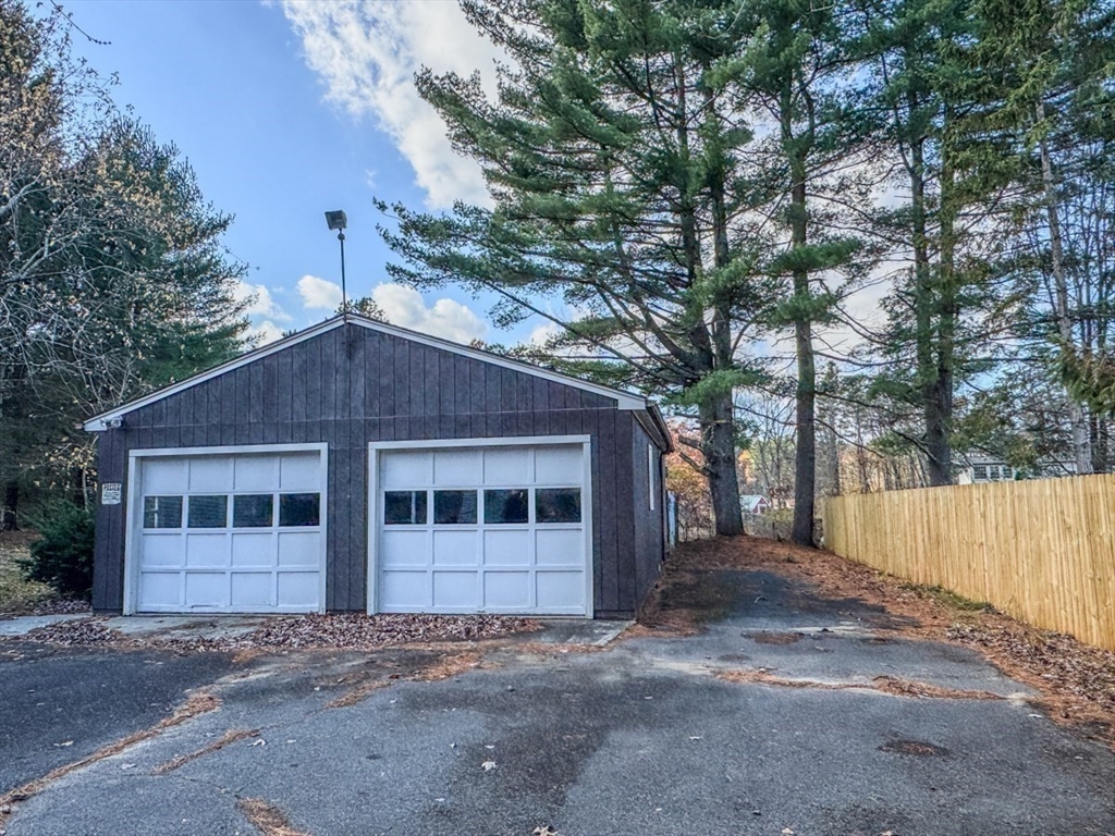 202 Turnpike Road Montague, MA 01351 - Photo 36 of 42 a house with trees in the background