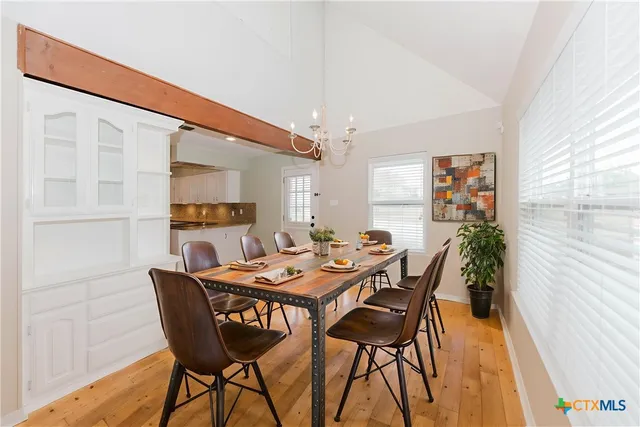 a kitchen with stainless steel appliances a stove a microwave and a refrigerator