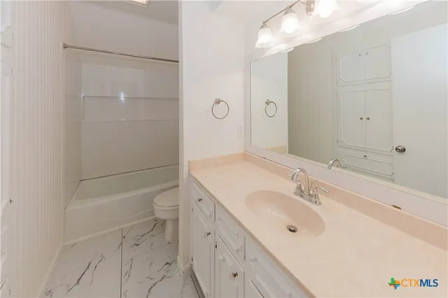 a view of a balcony with wooden floor