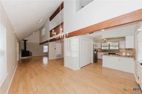 a view of a yard from a balcony