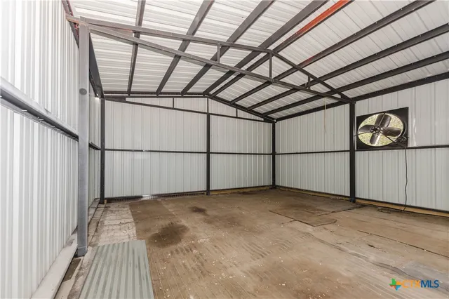 a view of a tree in a yard