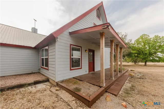 a view of a room with a flat screen tv