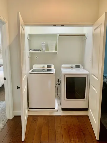 a utility room with washer and dryer
