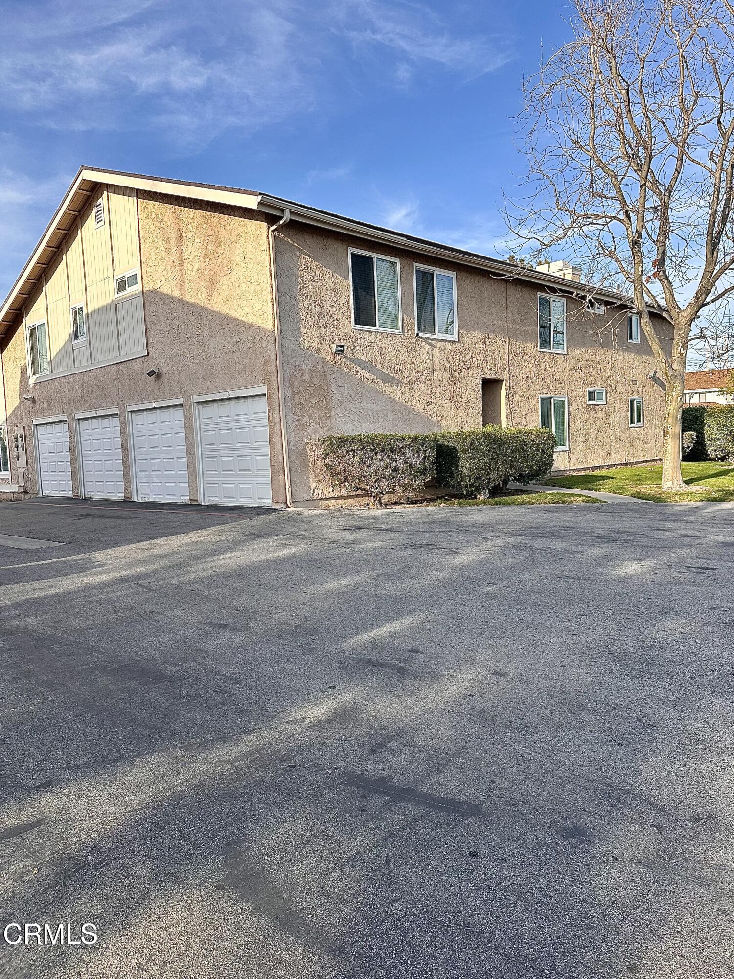 5212 Jefferson Square Oxnard, CA 93033 - Photo 12 of 12 a view of front of house with garage