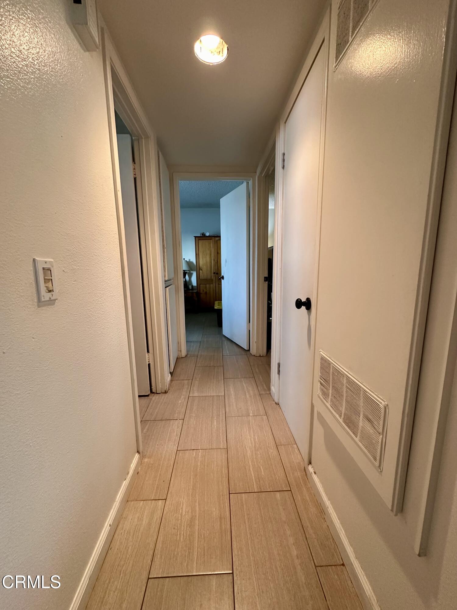 5212 Jefferson Square Oxnard, CA 93033 - Photo 6 of 12 a view of a hallway