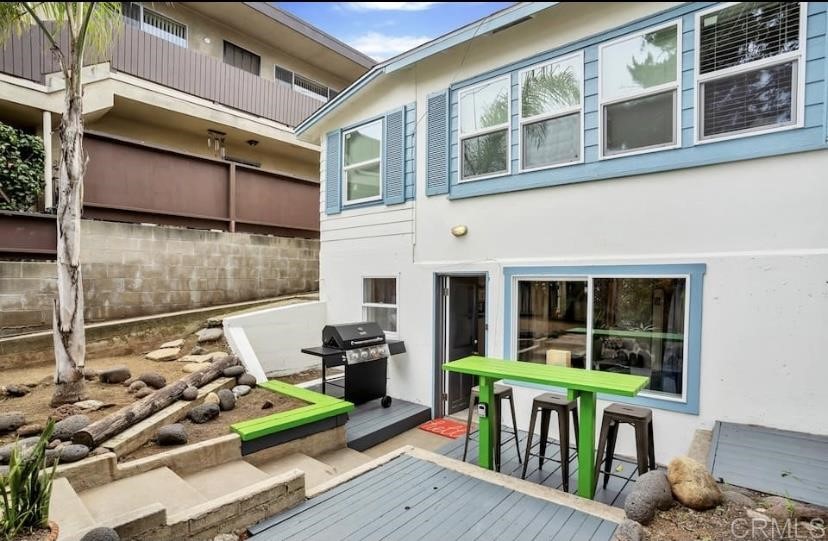 4377 Rialto Street San Diego, CA 92107 - Photo 12 of 15 a front view of a house with outdoor seating
