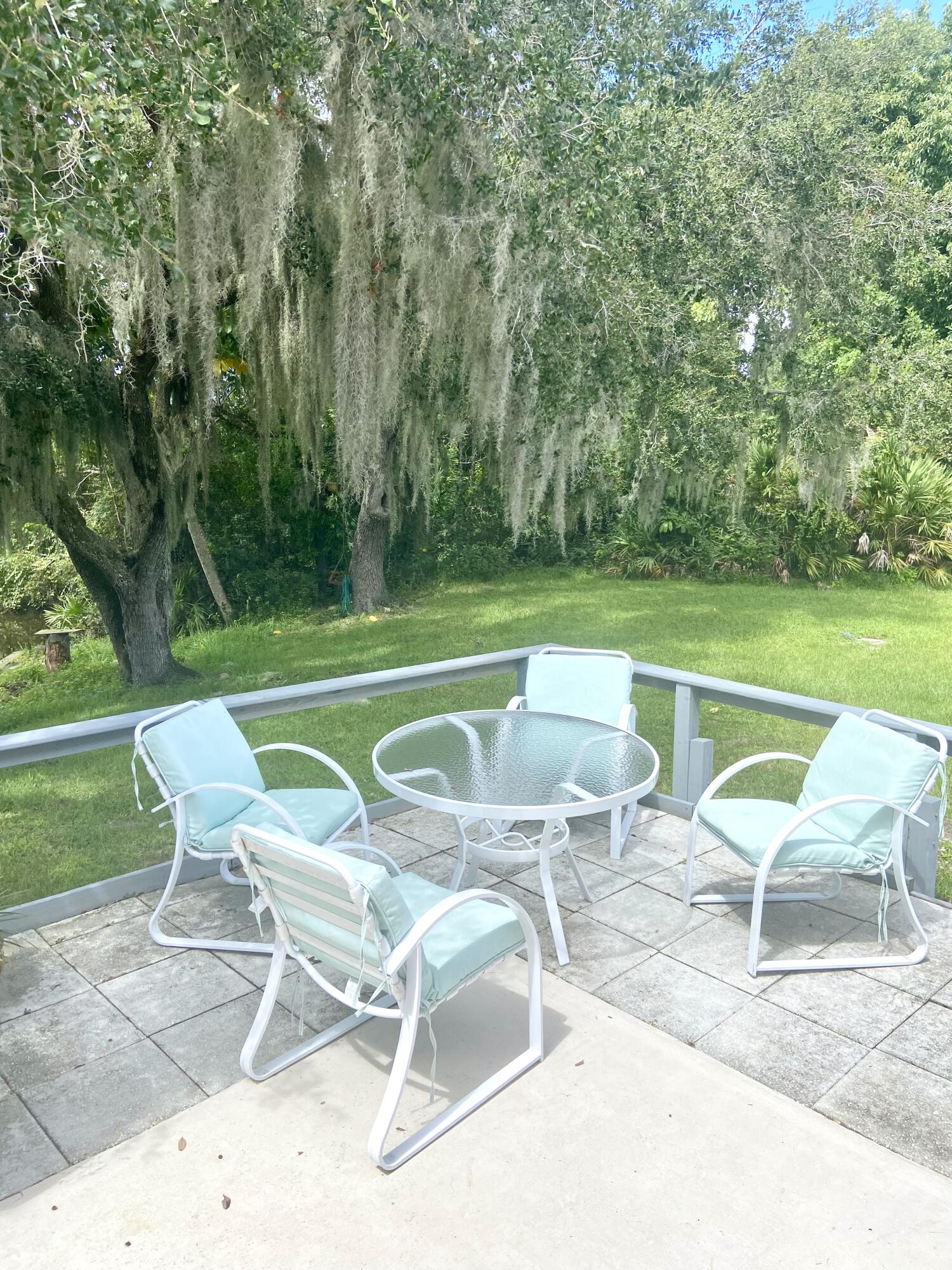 29 Quintana Roo Lane Port St. Lucie, FL 34952 - Photo 11 of 51 a view of a chairs and table in the patio