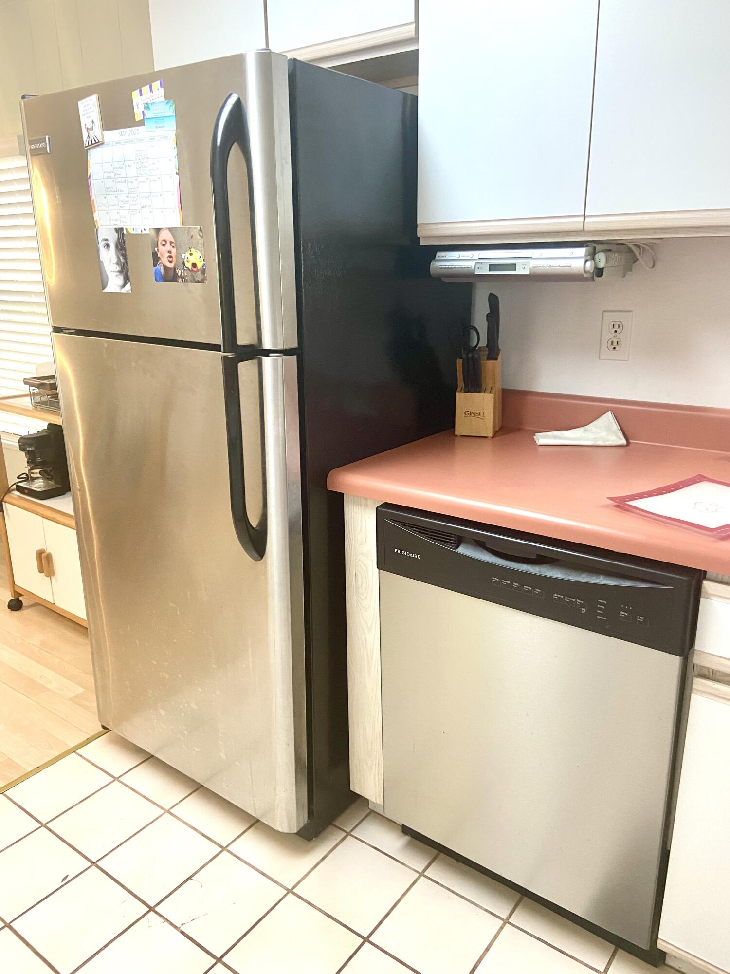 29 Quintana Roo Lane Port St. Lucie, FL 34952 - Photo 12 of 51 a white refrigerator freezer sitting inside of a kitchen