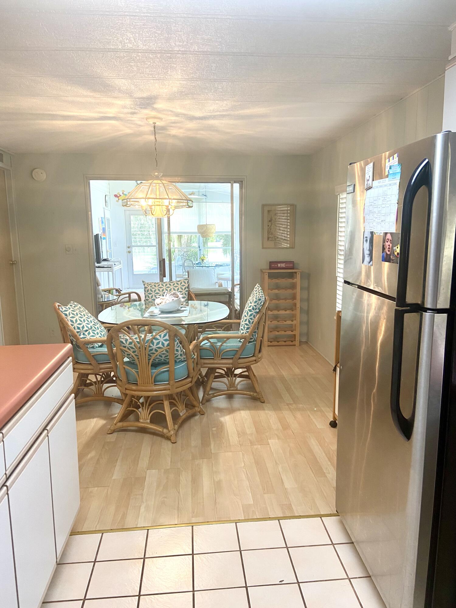 29 Quintana Roo Lane Port St. Lucie, FL 34952 - Photo 16 of 51 a dining room with furniture and a floor to ceiling window