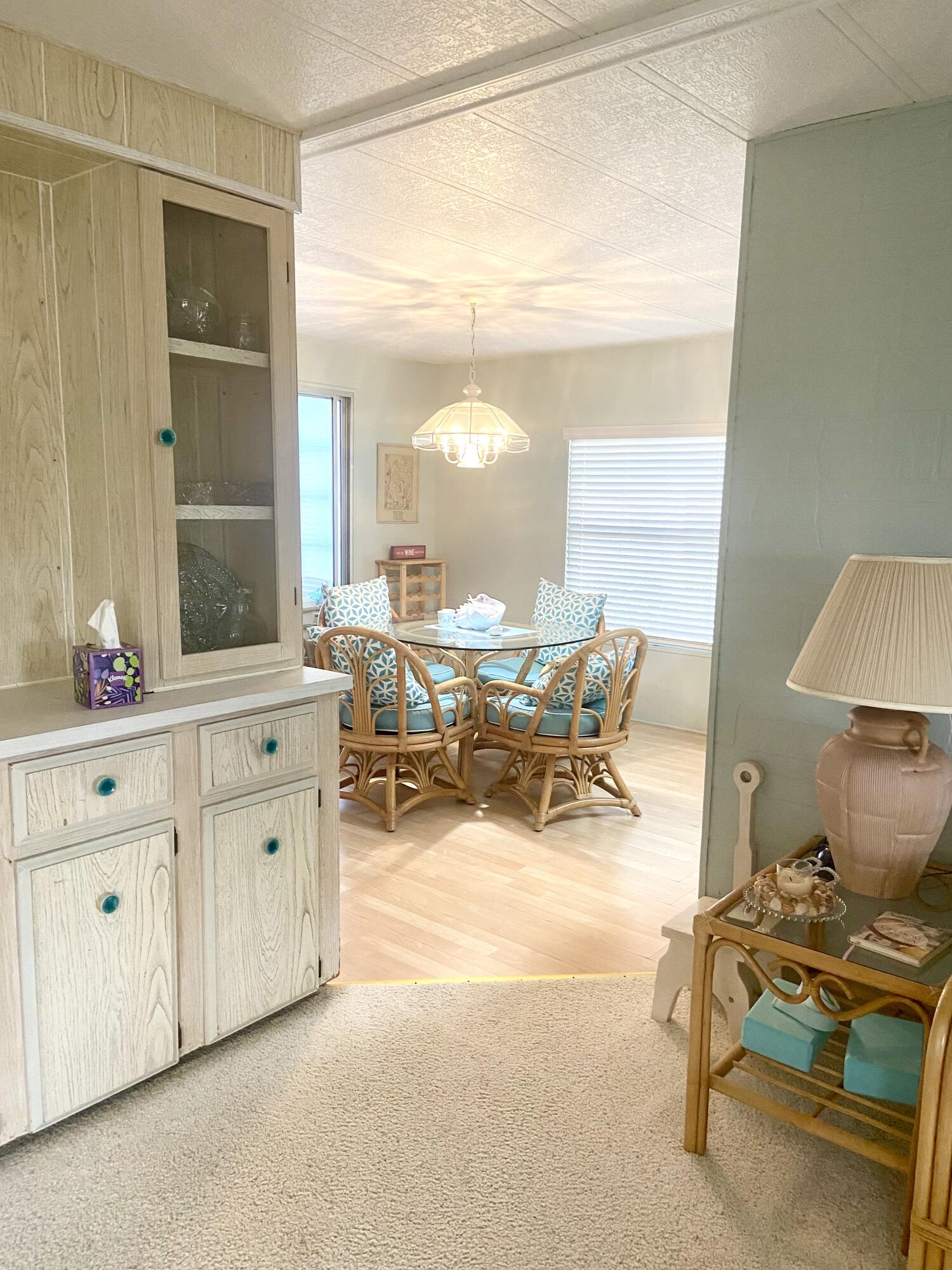 29 Quintana Roo Lane Port St. Lucie, FL 34952 - Photo 22 of 51 a living room with furniture a table and decor
