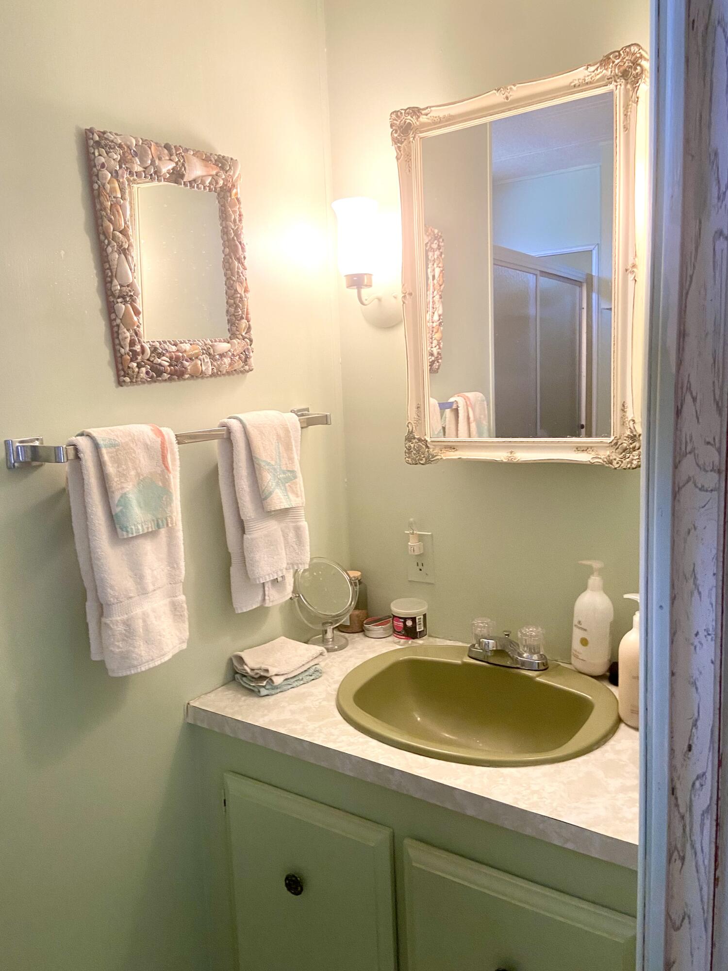 29 Quintana Roo Lane Port St. Lucie, FL 34952 - Photo 27 of 51 a bathroom with a sink and a mirror