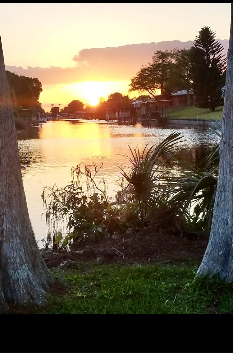29 Quintana Roo Lane Port St. Lucie, FL 34952 - Photo 47 of 51 a view of lake with mountain