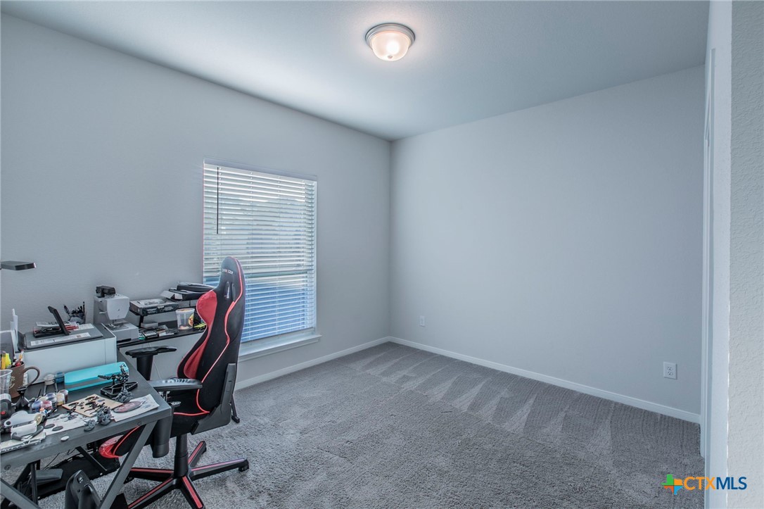 908 Coriander Road Temple, TX 76501 - Photo 21 of 28 a workspace with furniture and windows