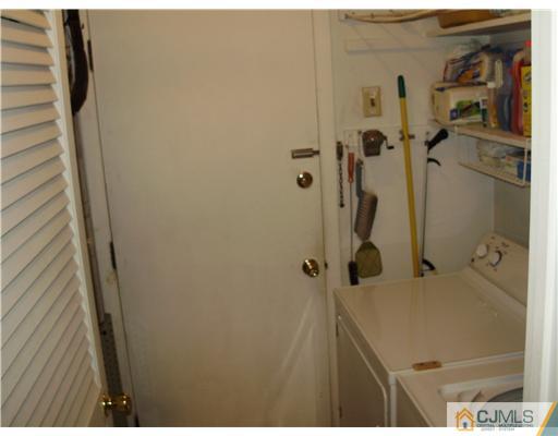 48 Woodbrook Road Edison, NJ 08820 - Photo 7 of 11 a bathroom with a shower