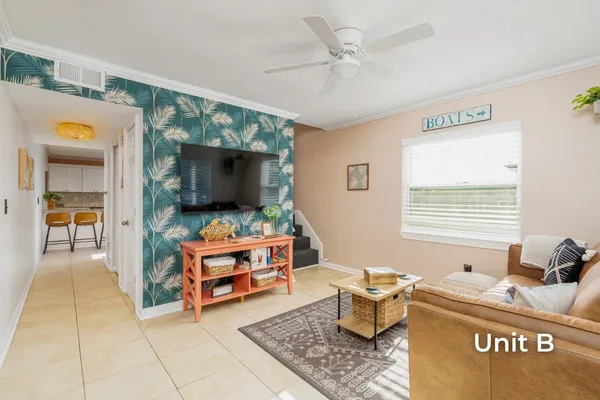 a view of cabinets with wooden floor and furniture