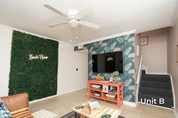 a living room with furniture and a table