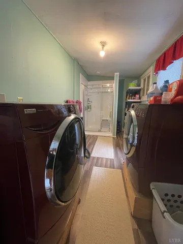 a room with a sink a vanity and window