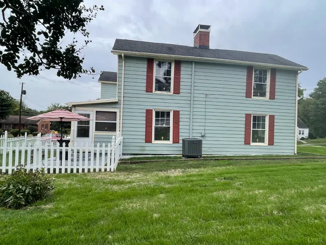 a view of a porch with a bench