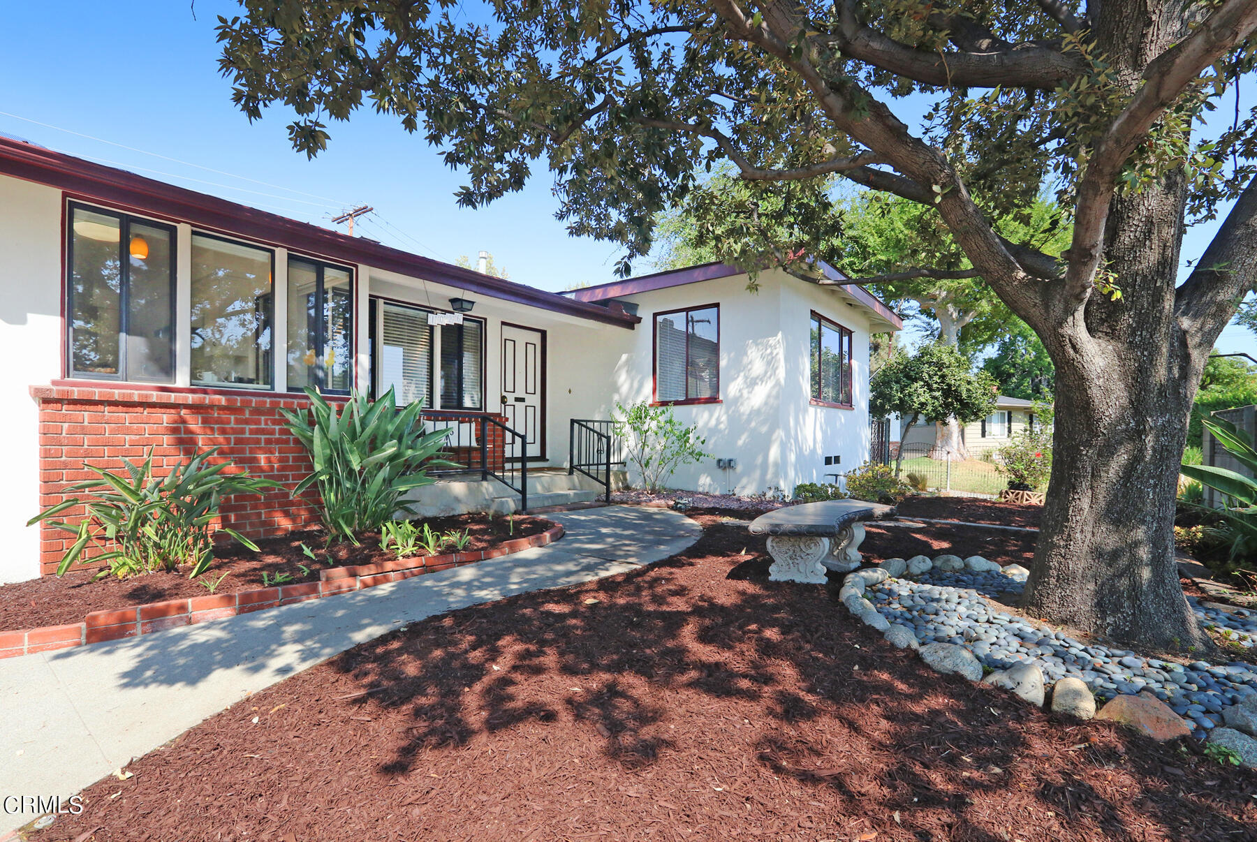 1026 Crestview Drive Pasadena, CA 91107 - Photo 2 of 29 a front view of a house with garden