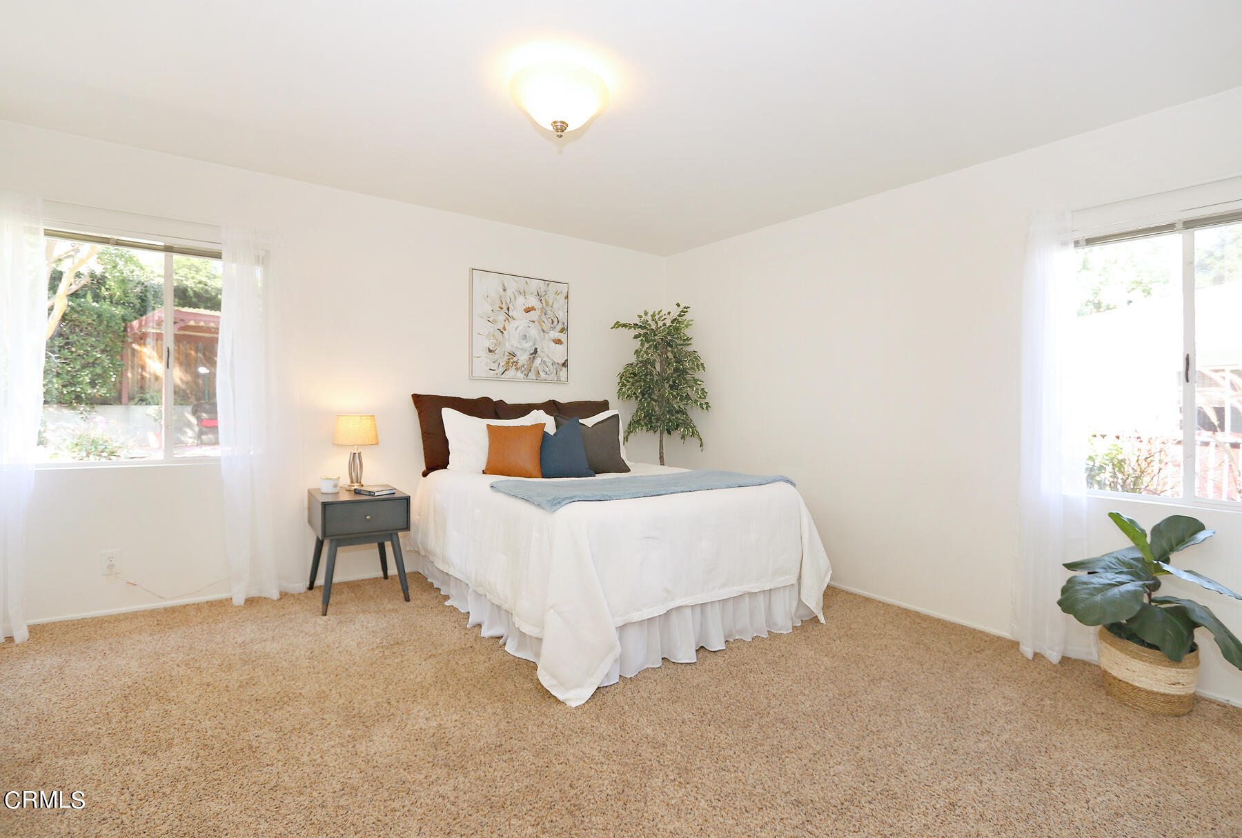 1026 Crestview Drive Pasadena, CA 91107 - Photo 17 of 29 a bed room with a bed and a chair