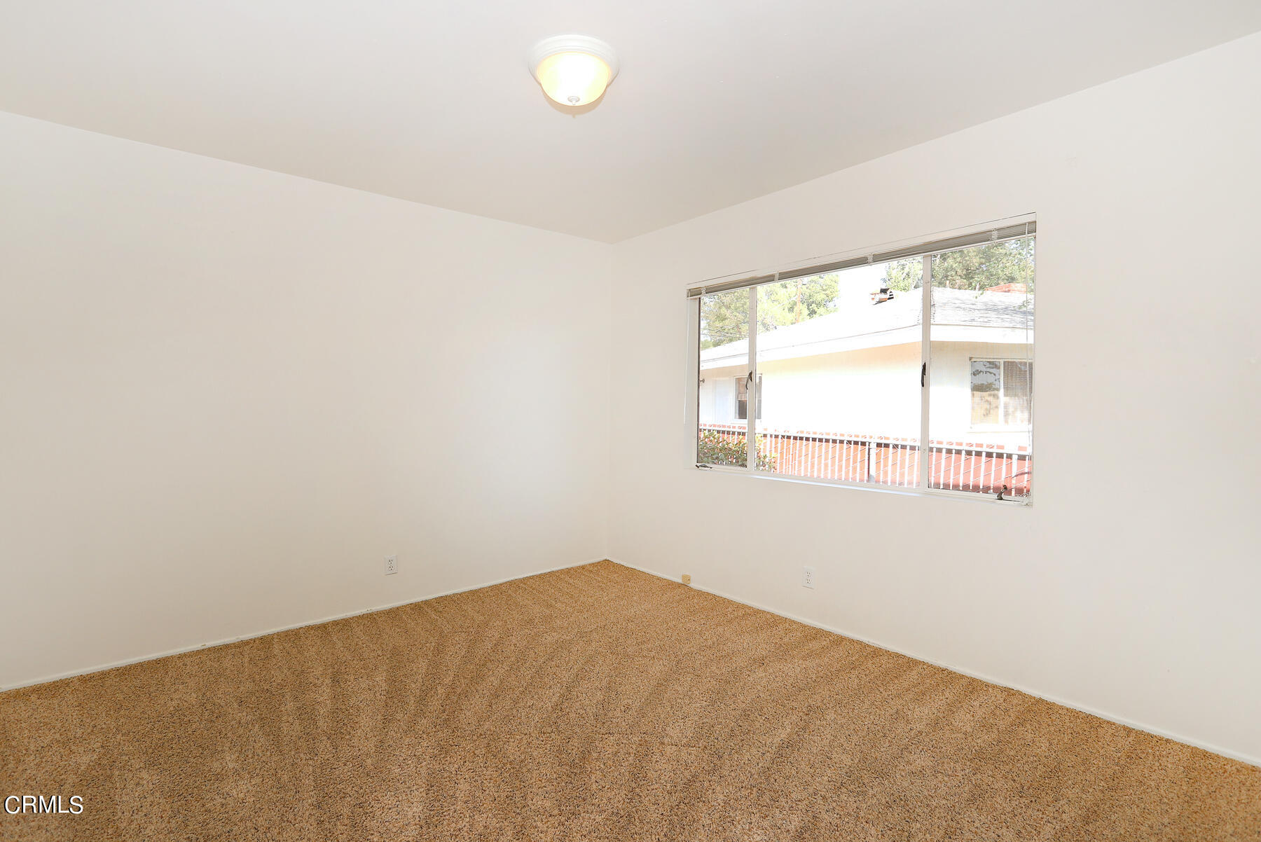 1026 Crestview Drive Pasadena, CA 91107 - Photo 20 of 29 an empty room with a window
