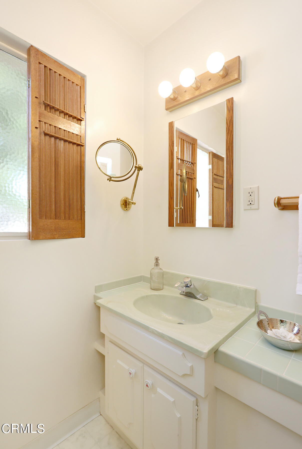 1026 Crestview Drive Pasadena, CA 91107 - Photo 21 of 29 a bathroom with a sink and a mirror