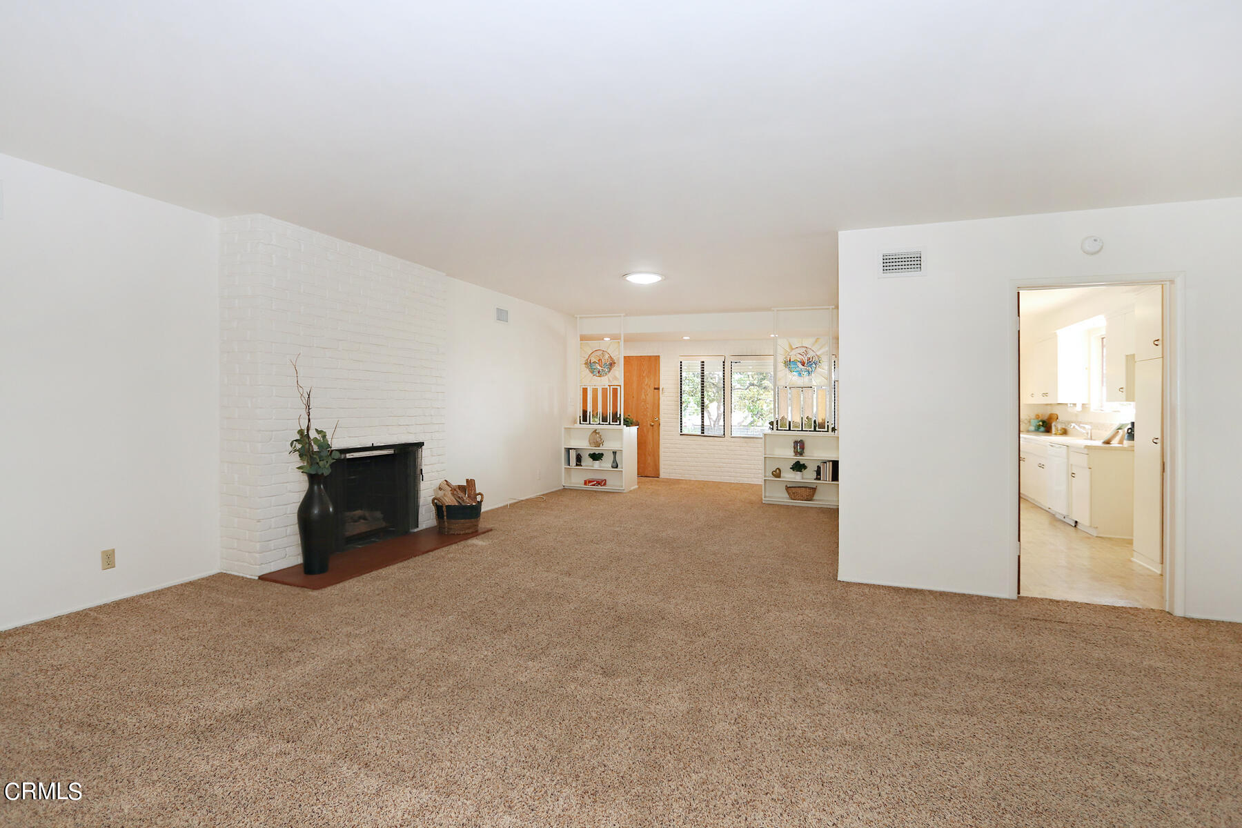 1026 Crestview Drive Pasadena, CA 91107 - Photo 8 of 29 a view of a livingroom with kitchen and furniture