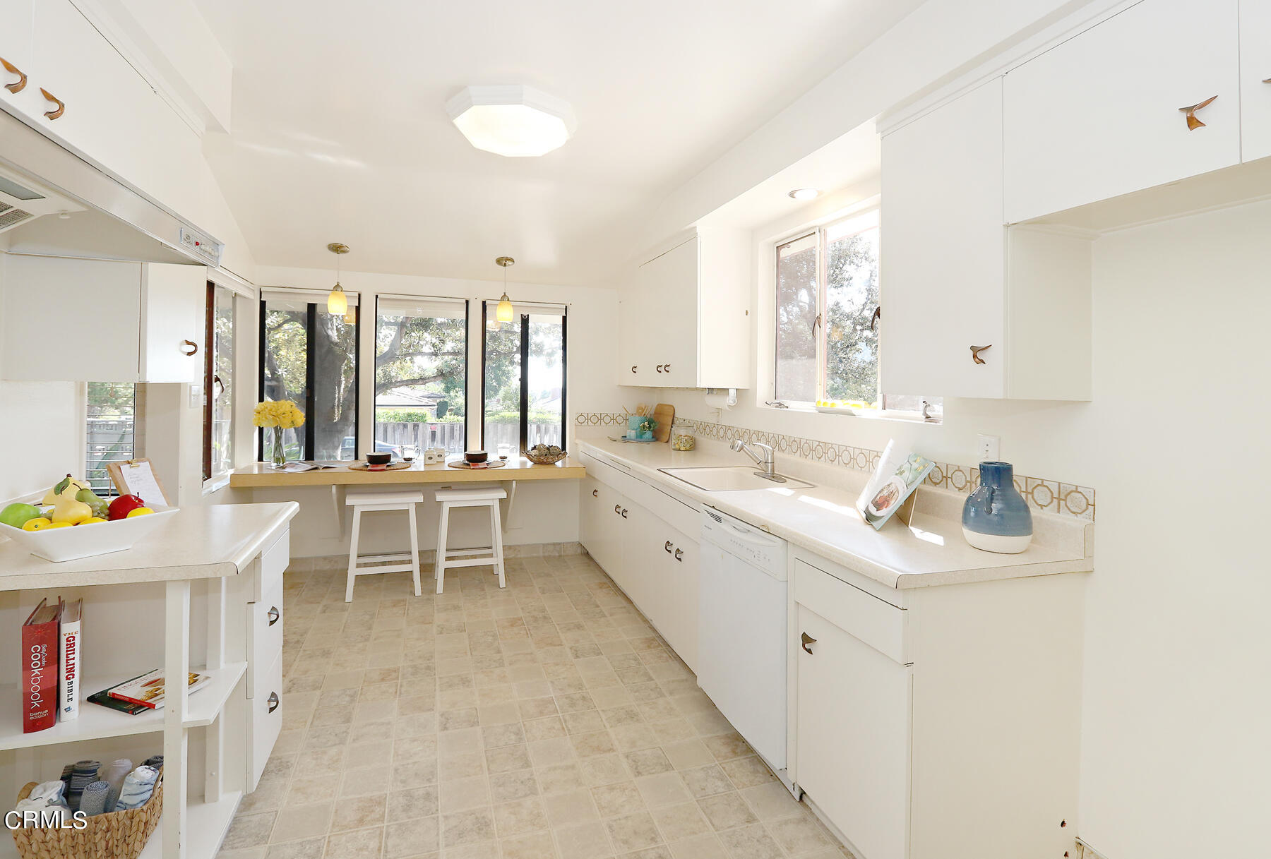 1026 Crestview Drive Pasadena, CA 91107 - Photo 9 of 29 a large white kitchen with furniture and window
