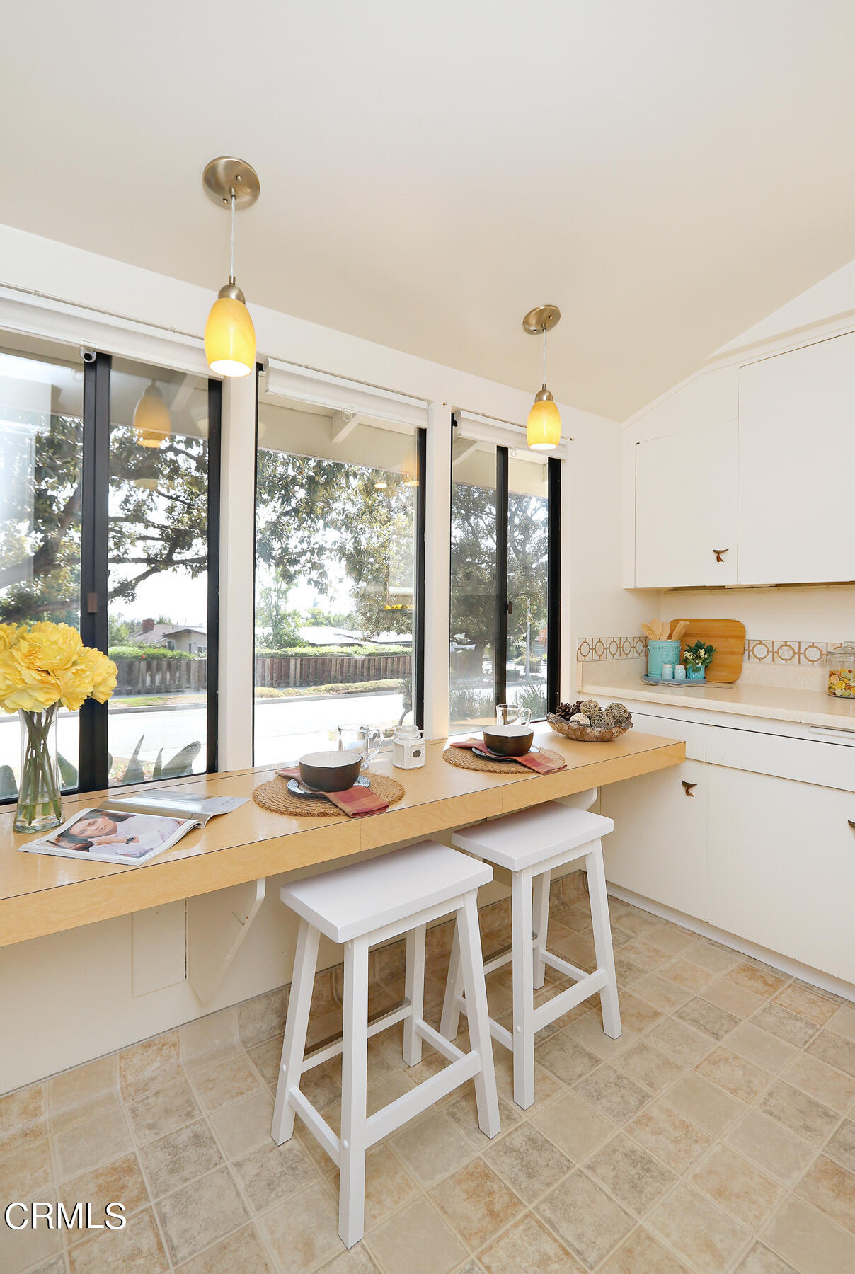 1026 Crestview Drive Pasadena, CA 91107 - Photo 10 of 29 a kitchen with a window and cabinets